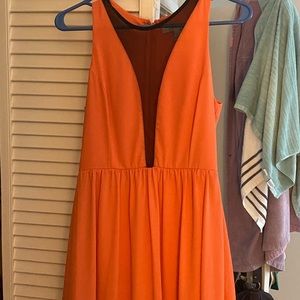 It’s a sleeveless dress with a little mesh on the top.